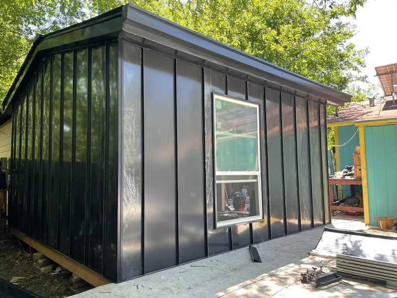 Black standing seam metal wall panels for Metal Roof Installation in Keyes