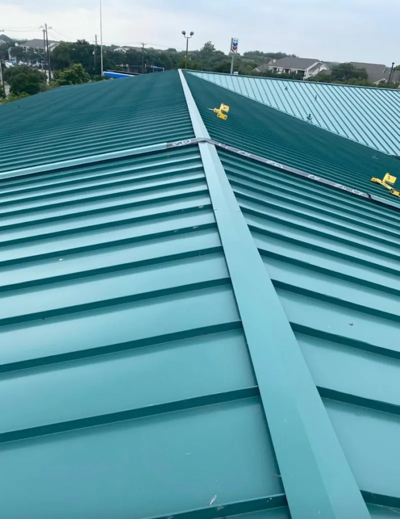 Green commercial metal roof ridge and valley for Metal Roof Repair in Keyes